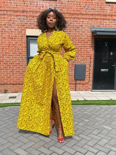 * Ankara maxi dress with back zipper,  two side pockets and a self tie belt. * This stunning dress can be worn for any occassion, suits all body shapes and sizes beautifully. * Dress has a surplice neckline and a thigh high slit. * This item is handmade with high quality 100% cotton african ankara fabric and ships within a week. *This item is handmade and ships within a week. * Rush service also available, if you need the item by a particular day, please send me an etsy conversation. A copy of o Kitenge Dress Designs Unique, African Maxi Dress Ankara, Ankara Maxi Dress, Dress African Print, Dress Ankara, African Print Dress Ankara, African Maxi Dresses, Ankara Dresses, Dress African