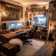 a home office with two computer monitors and a large rug in front of the desk