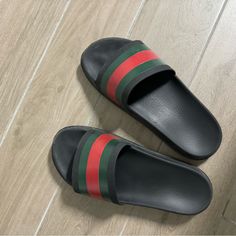 Gucci Men's Slide Sandal Black Rubber With Green And Red Web Molded Rubber Footbed Rubber Sole Flat Made In Italy Fits Size Us 11 - 12 Casual Black Sandals With Red Sole, Gucci Black Leather Slides, Black Leather Gucci Slides, Black Casual Gucci Slides, Casual Black Gucci Slides, Gucci Casual Slip-on Slides, Casual Gucci Slip-on Slides, Flat Gucci Sandals With Red Sole, Gucci Slip-on Sandals With Rubber Sole