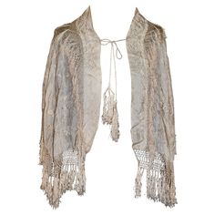 Cream silk. Hand embroidered with a floral motif. Hand knotted silk fringe. Hanging braided tassels on back. Tassels add 5" to length and width. Braided Tassels, Wedding Shawl, Embroidered Wedding, Cream Silk, Embroidered Silk, Floral Motif, Hand Embroidered, Hand Knotted, Shawl