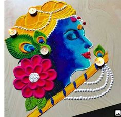 an artistic painting on the side of a building with flowers and pearls around it,