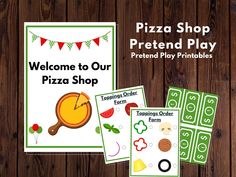 the welcome to our pizza shop printables are displayed on wooden boards with flags and bunting