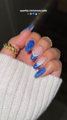 Christmas Nail Art Almond, Blue Sparkly Christmas Nails, December Nails Christmas Almond, Blue Sparkle Nails Almond, Christmas Nails Blue Short, Christmas Nails Almond Blue, Winter Nails White And Blue, Christmas Nails Blue And Silver, Winter Birthday Nails Almond