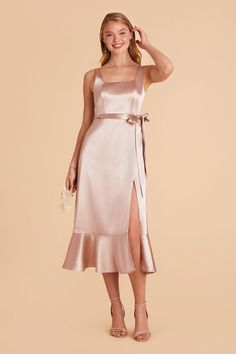 A convertible pinafore-style midi bridesmaid dress is a gorgeous addition to your cottagecore or garden wedding affair. This versatile, convertible midi is lovely, from its square neckline top to its romantic ruffled bottom. But this satin gown sweetest touch might be the removable bows at its straps | Taupe Bridesmaid Dress Shiny Satin Size XL | Birdy Grey Eugenia Convertible Midi Square Neckline Top, Taupe Bridesmaid Dresses, Neutral Bridesmaid Dresses, Midi Bridesmaid Dress, Champagne Bridesmaid Dresses, Gold Bridesmaid Dresses, Birdy Grey, Bridal Party Dresses, Satin Bridesmaid Dresses