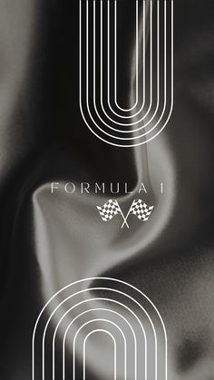 the logo for formula 1 is shown in white on black satin fabric, with an interlocked design