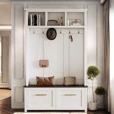 a living room with white walls and wooden flooring, built in bookshelves