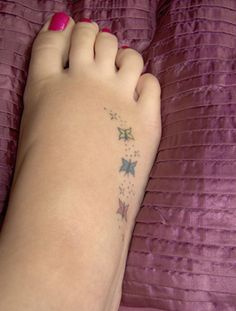 several different tattoos on the legs and feet of people who are not wearing shoes or pants