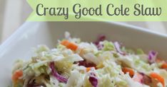 a white bowl filled with coleslaw and carrots