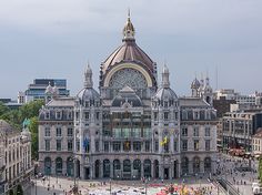 an aerial view of a large building in the city