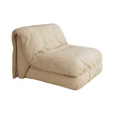 a beige futon chair sitting on top of a white floor