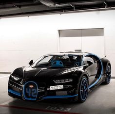 a bugatti car parked in a parking garage