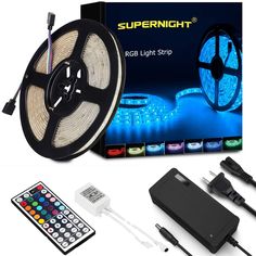 an image of a reel of led strip light with remote control and box on white background