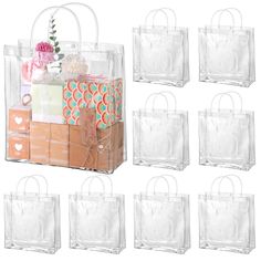 six clear bags with different designs on them and one has a flower in the middle