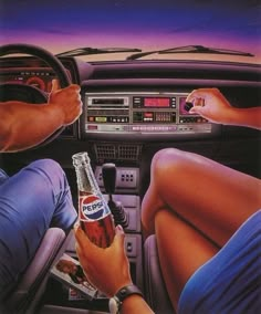 two people sitting in the driver's seat of a car, one holding a pepsi bottle