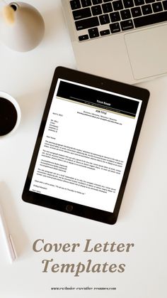 a tablet computer sitting on top of a white desk next to a cup of coffee