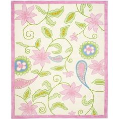 a pink and green rug with flowers on it