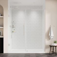 a bathroom with a walk in shower next to a sink