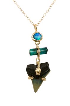 Gold & Stone Necklace - A flashy, blue-green Australian opal pairs perfectly with a natural teal tourmaline, set with a bright white diamond and fossilized shark tooth with tiny, hand-carved scallop shell detail. Set into hand-carved 14k gold, the three elements hang and swing separately from each other, offering playful movement to this statement piece. Springring clasp closure. Shark Teeth Jewelry, Gold Stone Necklace, Shark Tooth Pendant, Tooth Pendant, Shark Necklace, Scallop Shell, Shark Tooth, Tiny Hand, Shark Teeth