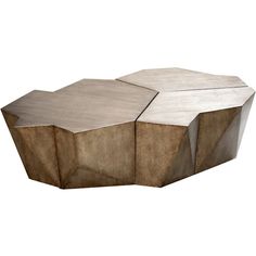 an unusual coffee table made out of wood and concrete, with three sections on each side