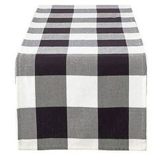 a black and white checkered table runner