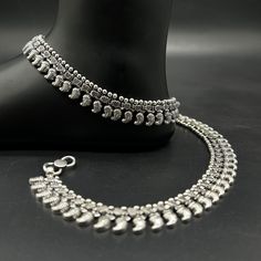 Name of product:  925 Sterling Silver Light Weight Anklet / Silver Payal Weight: 72 grams. Length: 26.5centimeter  Stamped: 925 FREE EXPRESS SHIPPING -----Feedback::- A satisfied customer is our top priority and your feedback forms the backbone of our success. Don't forget to give positive feedback along with good ratings. Thank You Silver Wedding Anklets With Oxidized Finish, Oxidized Metal Anklets, Silver Bracelets With Latkans As Gift, Silver Anklet As A Gift, Silver Anklets With Latkans For Wedding, Silver Wedding Anklets With Latkans, Silver Bracelet With Latkans In Metal, Silver Metal Bracelets With Latkans, Adjustable Silver Anklet With Oxidized Finish