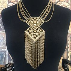 Vintage Goldette style large statement Fringe necklace, tassel jewelry, gift for her, vintage gift Large gold tone metal statement Fringe Goldette style necklace in very good vintage condition. Measures 19 in Long by 8 in Long on the pendant by 3 in wide.  Makes a great statement. #statement #tassel #fringe #goldette #style #necklace #jewelry #highendjewelry #collectible dtop3 Desert Hot Springs, Tassel Jewelry, Fringe Necklace, Tassel Fringe, Style Necklace, Vintage Gifts, Hot Springs, Gold Tone Metal, Necklace Jewelry