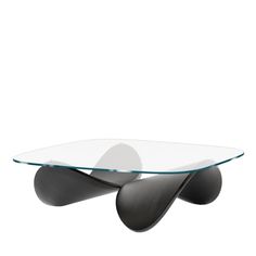 an oval glass coffee table with black legs and a curved design on the bottom, in front of a white background