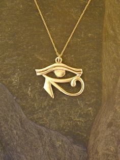 "This Eye of Horus pendant is 14K Gold. The included chain is a 14K Gold chain. You may choose 16, 18 or 20 inch at the same price. Other length available at sightly higher prices. This Eye of Horus pendant measures 15/16\" tall by 1 1/8\" across. I hand cast all my pieces using the lost wax casting method. Please ask your needs. You may call me with questions, often I am out so please use my machine. 831-476-3176. Satisfaction Guaranteed! I send items USPS First Class unless otherwise directed. Horus Jewelry, Gold Egyptian Jewelry, Gold Ankh Metal Jewelry, Gold Jewelry Egyptian, Eye Of Horus Pendant, Gold Pendent, Y2k Accessories, Eye Of Horus, Egyptian Jewelry