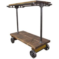 a wooden and metal cart with wheels