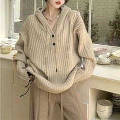 This beige knit hoodie features ribbed construction, a cozy loose fit, and a button-up closure in front Size:• S: Bust: 116cm/ 45.7 in, Length: 68cm/ 26.8 in, Sleeves: 51cm/ 20.1 in• M: Bust: 118cm/ 46.5 in, Length: 69cm/ 27.2 in, Sleeves: 52cm/ 20.5 in• L: Bust: 120cm/ 47.2 in, Length: 69cm/ 27.2 in, Sleeves: 52cm/ 20.5 in• XL: Bust: 122cm/ 48.0 in, Length: 70cm/ 27.6 in, Sleeves: 53cm/ 20.9 in• 2XL: Bust: 124cm/ 48.8 in, Length: 70cm/ 27.6 in, Sleeves: 53cm/ 20.9 in• 3XL: Bust: 126cm/ 49.6 in, Casual Beige Polo Sweater For Winter, Casual Beige Winter Polo Sweater, Beige Knit Hoodie For Fall, Cozy Long Sleeve Beige Polo Sweater, Cozy Beige Polo Sweater For Fall, Casual Neutral Sweater For Winter, Casual Cream Polo Sweater For Winter, Casual Neutral Winter Sweater, Winter Cream Polo Sweater With Ribbed Cuffs