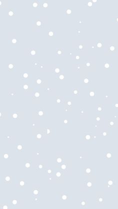 the snow is falling down and there are many white dots on the gray wallpaper