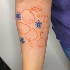 an orange and blue tattoo on the left arm with words that read organ ge written below it