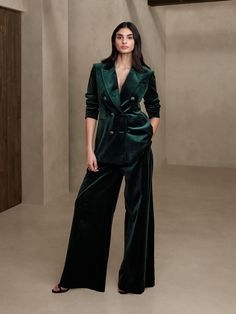 Tailored luxury.  Discover the sumptuous feel of soft, cotton velvet —a seasonal sensation— meticulously tailored with structured shoulders, a peak lapel, and a double-breasted closure for endless appeal.  Peak lapel.  Double-breasted closure.  F Velvet Dresses Formal, Dark Green Formal Dress Velvet, Green Velvet Dress Long Formal, Velvet Dress Bridal Party, Emerald Green Suit Dress, Coat Over Long Formal Dress, Luxury Chic Double Breasted Suit For Fall, Luxury Spring Double Breasted Suit For Office Wear, Formal Velvet Dresses