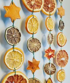 orange slices and star decorations hanging from string