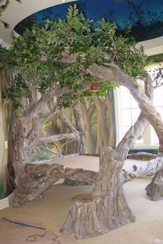 a fake tree in the middle of a room