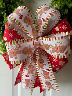 a close up of a christmas bow on a door