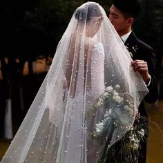 the bride and groom are dressed up for their wedding