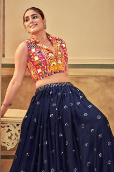 Embrace the festive spirit of Navratri with our exquisite Designer Lehenga Choli, a masterpiece crafted to make you shine brighter than the Garba lights. This stunning ensemble, adorned with intricate embroidery work, is the perfect blend of tradition and contemporary fashion, designed to elevate your festive wardrobe. Garba Chaniya Choli, Garba Outfit, Chaniya Choli Designs, Garba Dress, Navratri Garba, Dress Saree, Navratri Dress, Simple Lehenga, Traditional Blouse Designs