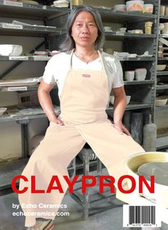 a woman in an apron is sitting on a stool