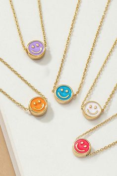 This Mini Smiley Face Necklace features a petite pendant with an adorable smiley face, attached to an adjustable chain (16" + 3" extender). Express your fun and playful personality with this cute accessory. Smiley Face Necklace, Face Necklace, Smiley Face, Smiley, Chain, Pendant