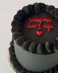 there is a chocolate cake with writing on it that says vampires don't age