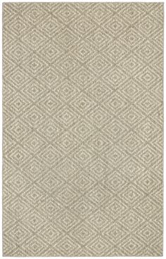 a beige rug with an abstract design