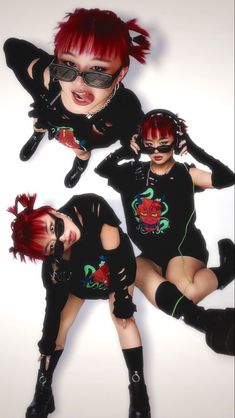 three women with red hair and black clothing are posing for the camera while wearing sunglasses