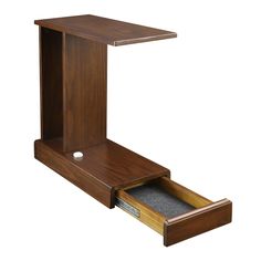 a wooden desk with an open drawer