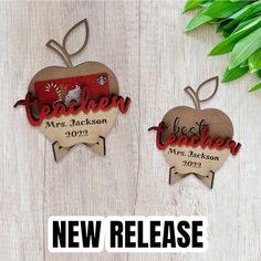 two apple shaped ornaments with the words teacher and mrs jackson on them