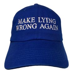 a blue hat with the words make lying wrong again on it, and white writing