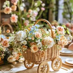 a wicker basket filled with flowers sitting on top of a table next to plates