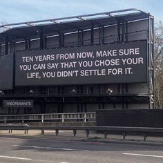 an advertisement on the side of a building that says ten years from now, make sure you can say that you chose your life, you didn't seattle for it