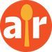 an orange and white logo with the word air in it's center, on top of