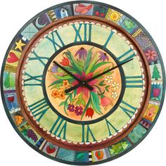 a colorful clock with flowers painted on it's face and numbers in the middle